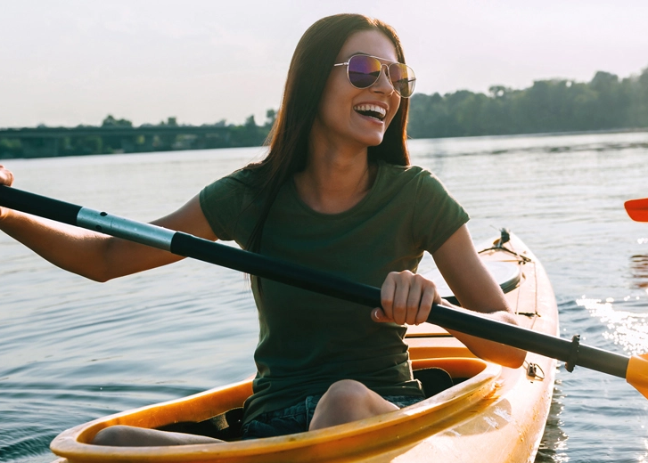 Woman in a canoe on the lake 